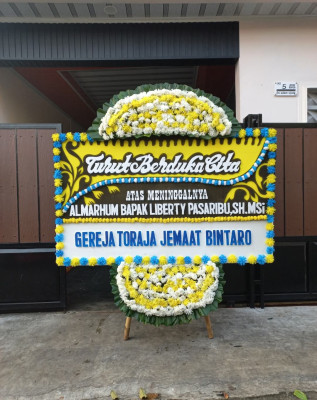 Papan Bunga Duka di Werima